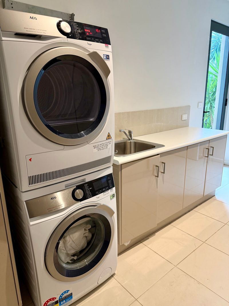 Private laundry with washing machine and dryer