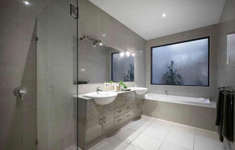 Main bathroom with walk-in shower and wide vanity