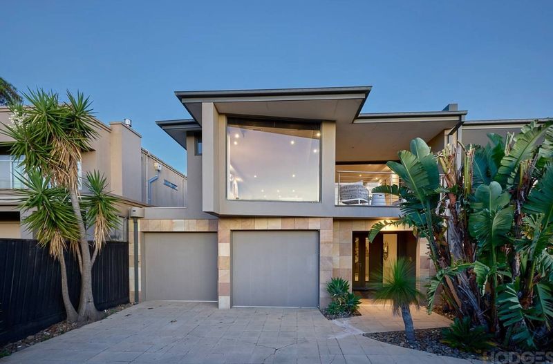 Contemporary street frontage and secure garage