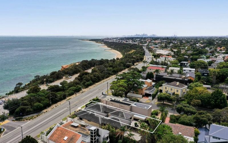 Aerial view showing Beach Road House opposite Half Moon Bay